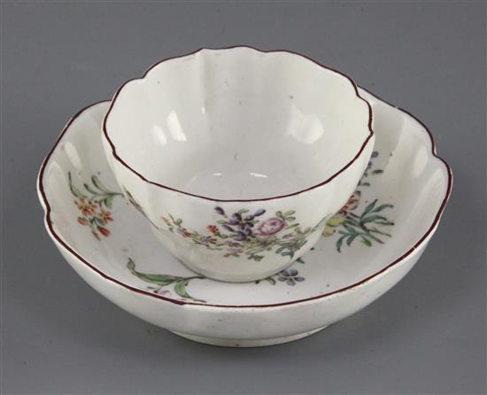 A Chelsea petal lobed tea bowl and saucer, c.1755, saucer 11cm